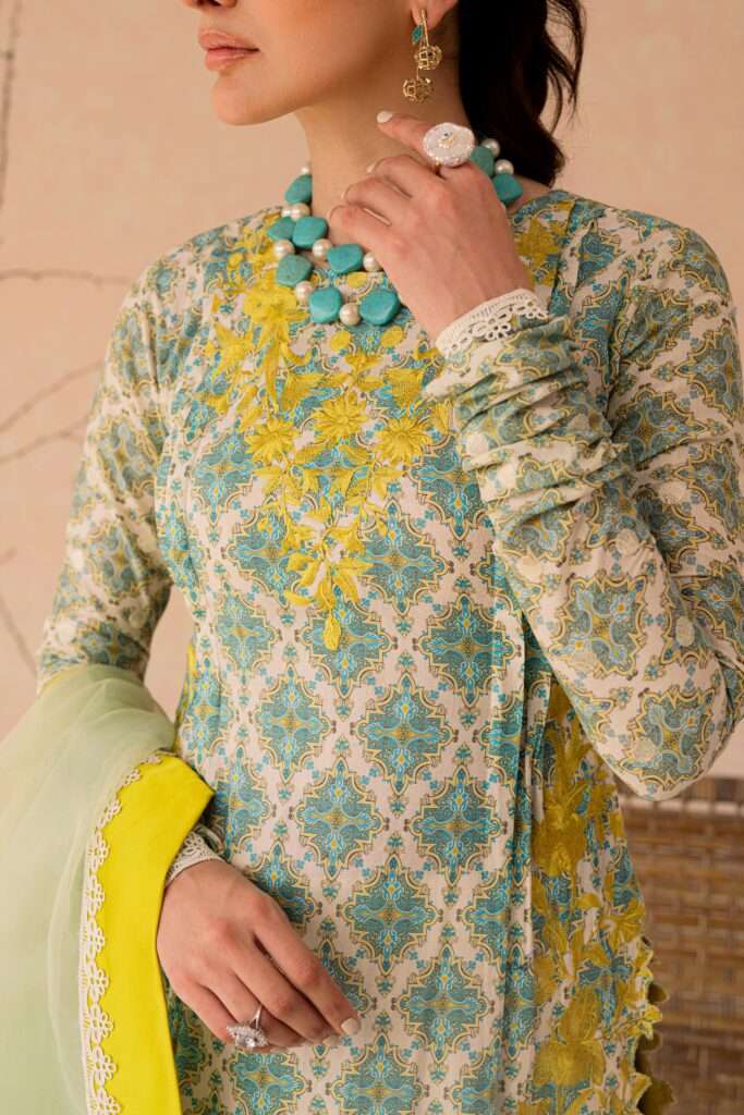 a woman wearing a green and yellow outfit.